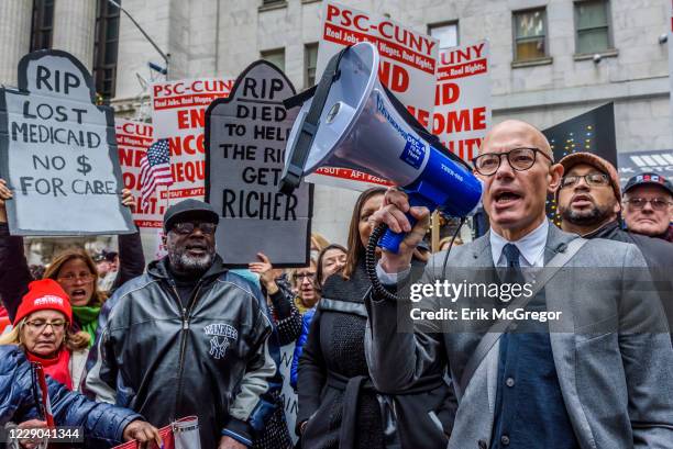 Michael Kink, Executive Director of the Strong Economy For All Coalition - About 500 protesters chanting Kill the Bill, Dont Kill Us! filled the...
