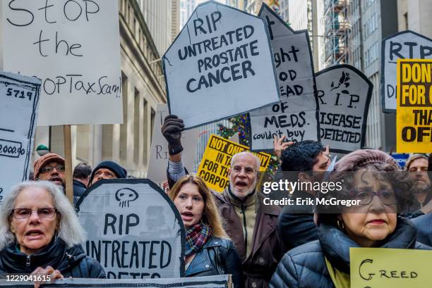 About 500 protesters chanting Kill the Bill, Dont Kill Us! filled the street outside the New York Stock Exchange on December 19, 2017; where the...