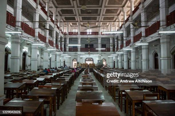 Desks lined up as a class takes place inside Curzon Hall at the University of Dhaka, on the 29th of September 2018 in Dhaka, Bangladesh. The Curzon...