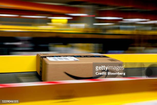An Amazon Prime parcel passes along a conveyor at an Amazon.com Inc. Fulfillment center in Frankenthal, Germany, on Tuesday, Oct. 13, 2020. Amazon's...