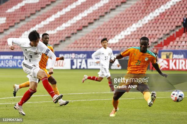 Daichi Kamada of Japan, Eric Bailly of Ivory Coast during the friendly match between Japan and Ivory Coast at Stadium Galgenwaard on October 13, 2020...