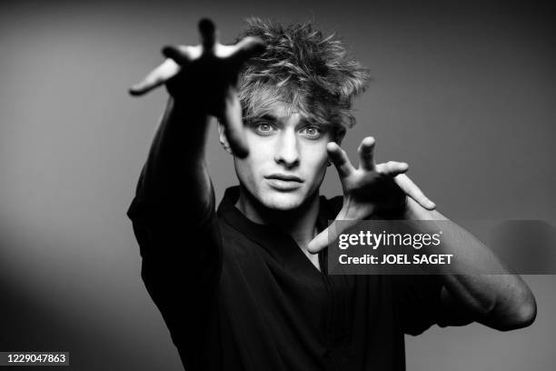 French actor Maxence Danet-Fauvel poses for a photo session during the 3rd edition of the Cannes International Series Festival in Cannes, southern...