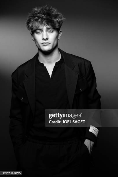 French actor Maxence Danet-Fauvel poses for a photo session during the 3rd edition of the Cannes International Series Festival in Cannes, southern...