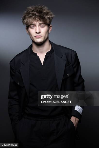 French actor Maxence Danet-Fauvel poses for a photo session during the 3rd edition of the Cannes International Series Festival in Cannes, southern...