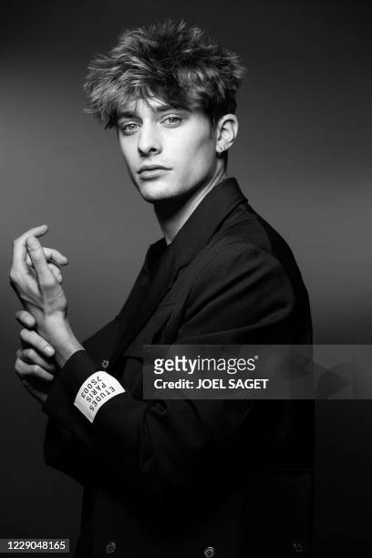 French actor Maxence Danet-Fauvel poses for a photo session during the 3rd edition of the Cannes International Series Festival in Cannes, southern...