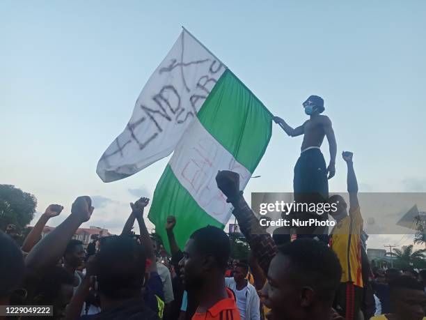 End SARS protesters occupy Ibadan-Lagos Expressway on Monday. Commuters and motorists suffered unprecedented traffic jam as angry Nigerian youths,...