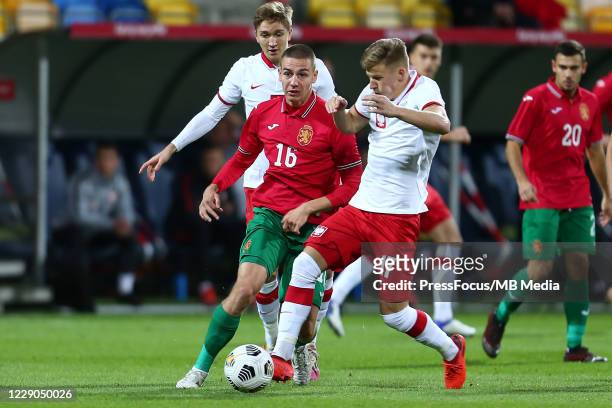 Valentin Antov of Bulgaria tackles Mateusz Bogusz of Poland during the UEFA Euro Under 21 Qualifier match between Poland U21 and Bulgaria U21 at...