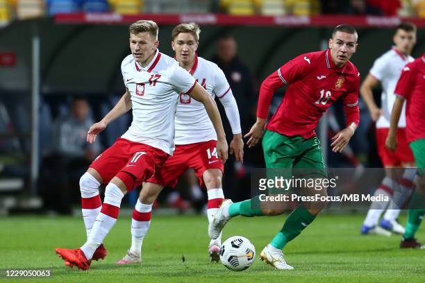 Valentin Antov of Bulgaria tackles Mateusz Bogusz of Poland during the UEFA Euro Under 21 Qualifier match between Poland U21 and Bulgaria U21 at...