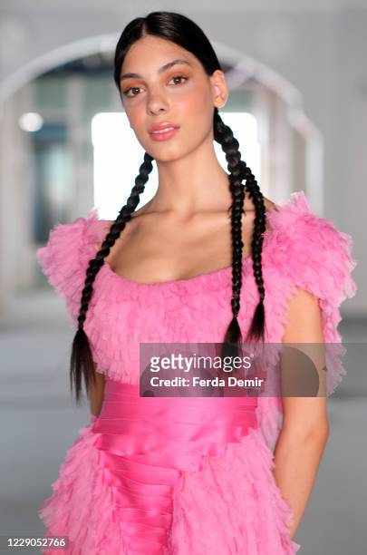 In this image released on October 13, A model backstage ahead of the Nedo by Nedret Taciroglu show during Mercedes-Benz Istanbul Fashion Week at...