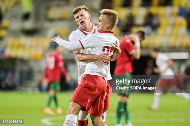 Bartosz Bida of Poland seen celebrating a goal with Mateusz Bogusz seen in action during football U-21 European Championships 2021 Qualifiers match...