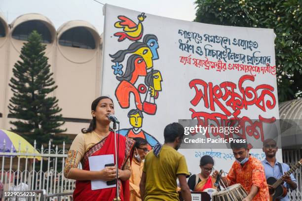 Activist expressing her opinion during the demonstration. Activists take part in an ongoing protest demanding justice for an alleged gang raped woman...