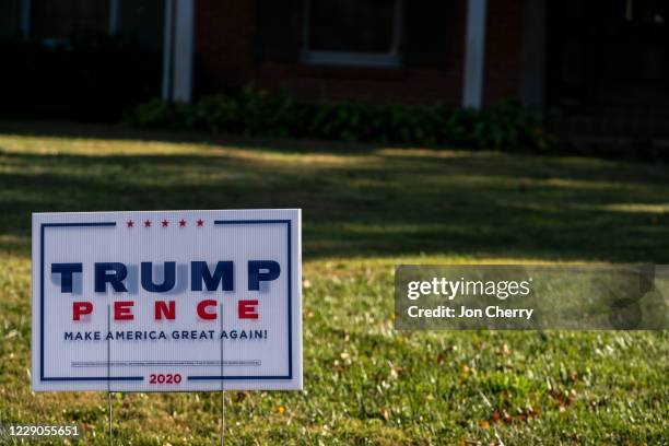 Trump/Pence yard sign is seen on October 13, 2020 in Louisville, Kentucky. Tuesday marked the first day of early in-person voting in Kentucky, which...