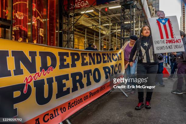 Call to Action in Puerto Rico and Pro Libertad called for a picket/rally in front of the Trump Tower in Manhattan. Hundreds took to the streets in...