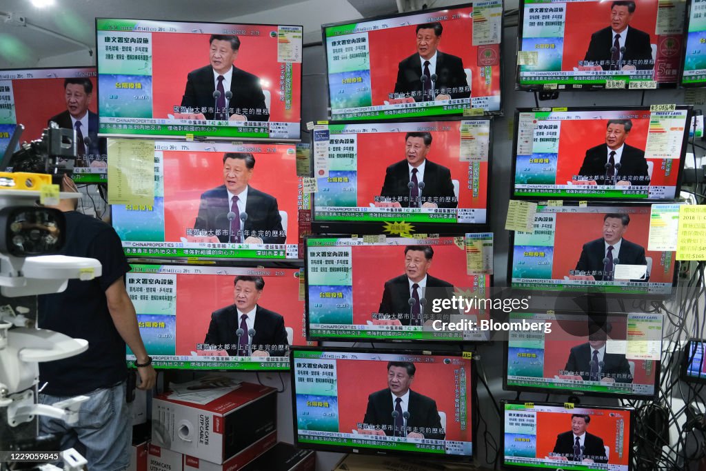 Public Screens as China's Leader Xi Jinping Delivers Speech in Shenzhen