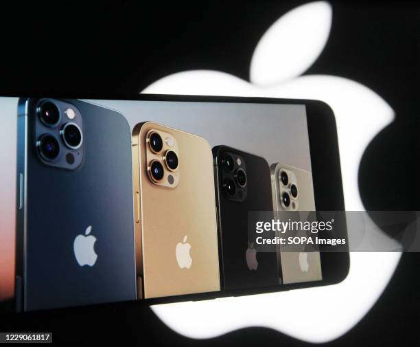 In this photo illustration a screenshot from Apple's launch promotional material of the New iPhone12 Pro seen displayed on a mobile phone screen with...