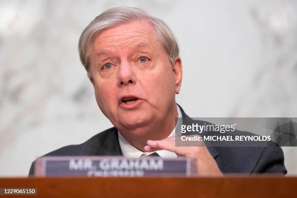 Chairman Sen. Lindsey Graham participates before nominee Judge Amy Coney Barrett's testimony on the third day of her confirmation hearing before the...