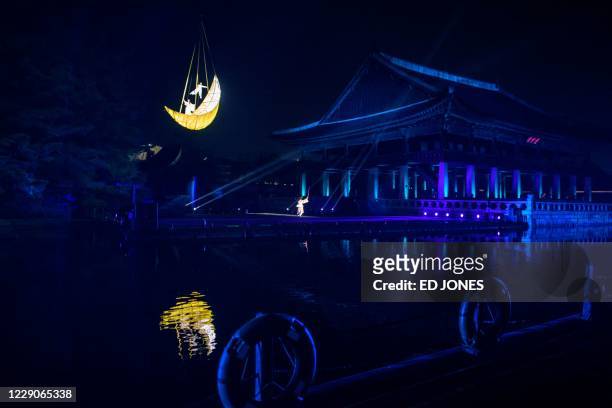 Members of the Musai Dance company perform a show entitled Gyeonghoeru as part of the 6th annual royal culture festival, at Gyeongbokgung palace in...