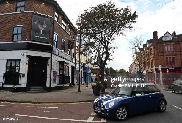 An image of Britain's Prime Minister Boris Johnson, Britain's Health Secretary Matt Hancock and Number 10 special advisor Dominic Cummings, is...