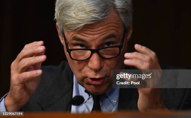 Sen. Sheldon Whitehouse questions Supreme Court nominee Judge Amy Coney Barrett as she testifies before the Senate Judiciary Committee on the third...