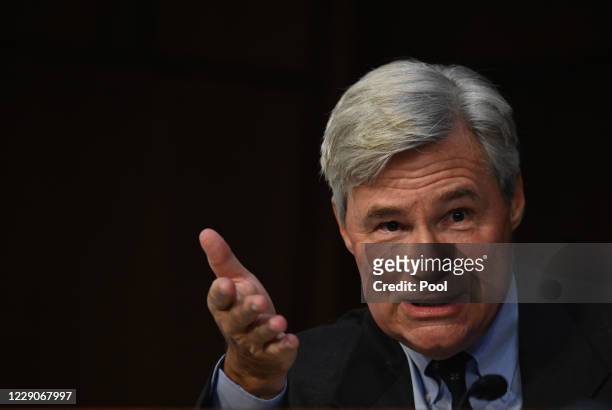 Sen. Sheldon Whitehouse questions Supreme Court nominee Judge Amy Coney Barrett as she testifies before the Senate Judiciary Committee on the third...