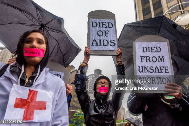 Coalition of physicians, AIDS activists, medical students, and womens health and rights advocates staged a political theater piece in front of the...