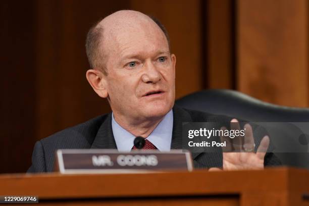 Sen. Christopher Coons speaks as Supreme Court nominee Judge Amy Coney Barrett testifies before the Senate Judiciary Committee on the third day of...