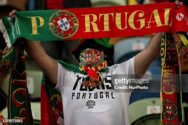 Portugals fan celebrates during the UEFA Nations League group stage match between Portugal and Sweden, at the Jose Alvalade stadium in Lisbon,...