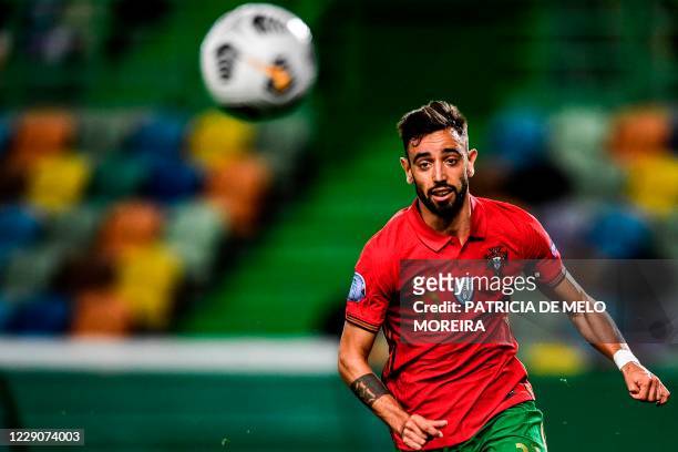 Portugal's midfielder Bruno Fernandes runs for the ball during the Nations League A group 3 football match between Portugal and Sweden at the...