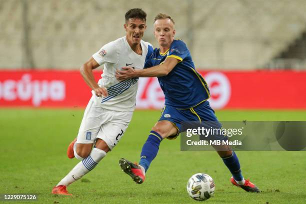 Dimitris Giannoulis of Greece and Florent Hadergjonaj of Kosovo during the UEFA Nations League group stage match between Greece and Kosovo at OACA...