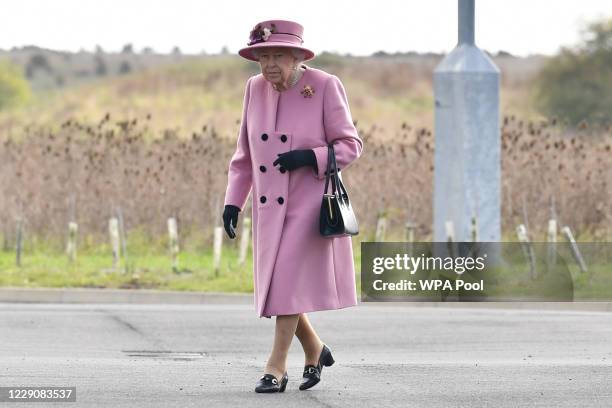 Britain's Queen Elizabeth II arrives at the Energetics Analysis Centre as they visit the Defence Science and Technology Laboratory at Porton Down...