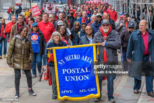 Verizon workers on strike, supporters and elected leaders marched to a Verizon Wireless office on Wall Street. Verizon workers remain on strike and...