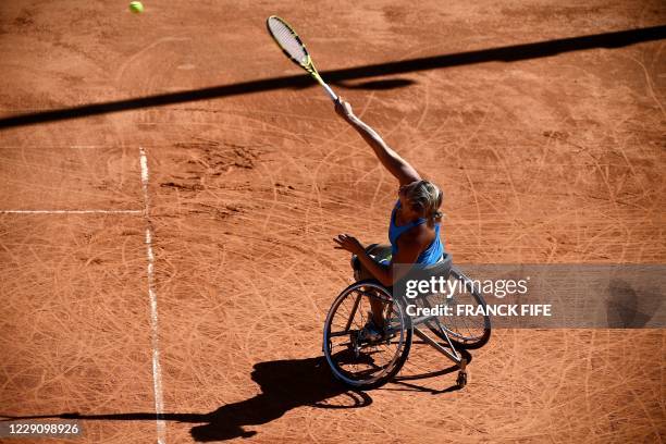 French tennis para athlete Pauline Deroulede serves the ball during the 4rd edition of the French Riviera Open wheelchair tennis tournament at Biot,...