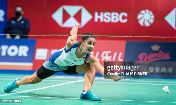 Spain's Carolina Marin plays against US's Beiwen Zhang during the women's singles match of the Danisa Denmark Open Badminton in Odense, Denmark, on...
