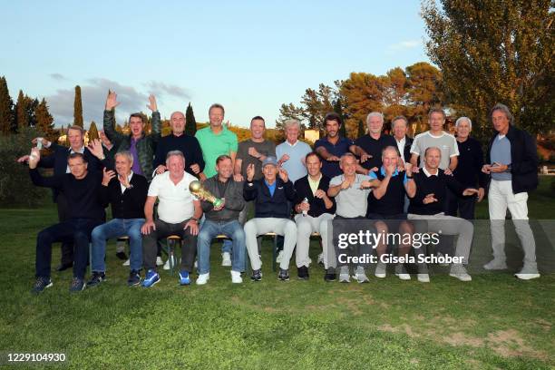 First row: Andreas Moeller, Pierre Littbarski, Andreas Brehme, Thomas Haessler, Franz Beckenbauer, Holger Osieck, Olaf Thon, Stefan Reuter, Hans...