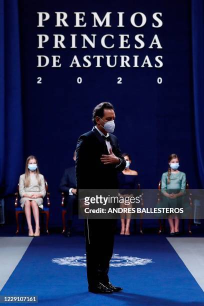 Andrea Morricone, son of recently deceased Italian composer Ennio Morricone, gestures as he accepts the Princess of Asturias Award for the Arts on...