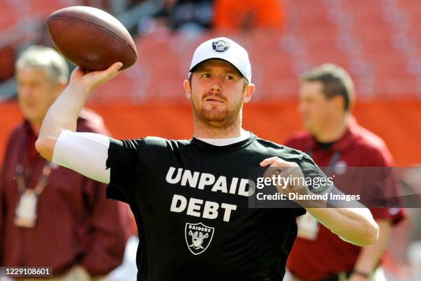 Quarterback Matt McGloin of the Oakland Raiders throws a pass prior to a game against the Cleveland Browns on September 27, 2015 at FirstEnergy...