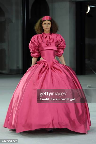 In this image released on October 16, A model walks the runway during the Hakan Yldrm show during Mercedes-Benz Istanbul Fashion Week at Galataport...