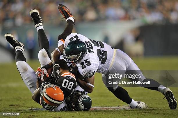 Safety Jarrad Page of the Philadelphia Eagles hits Brian Robiskie of the Cleveland Browns at Lincoln Financial Field on August 25, 2011 in...