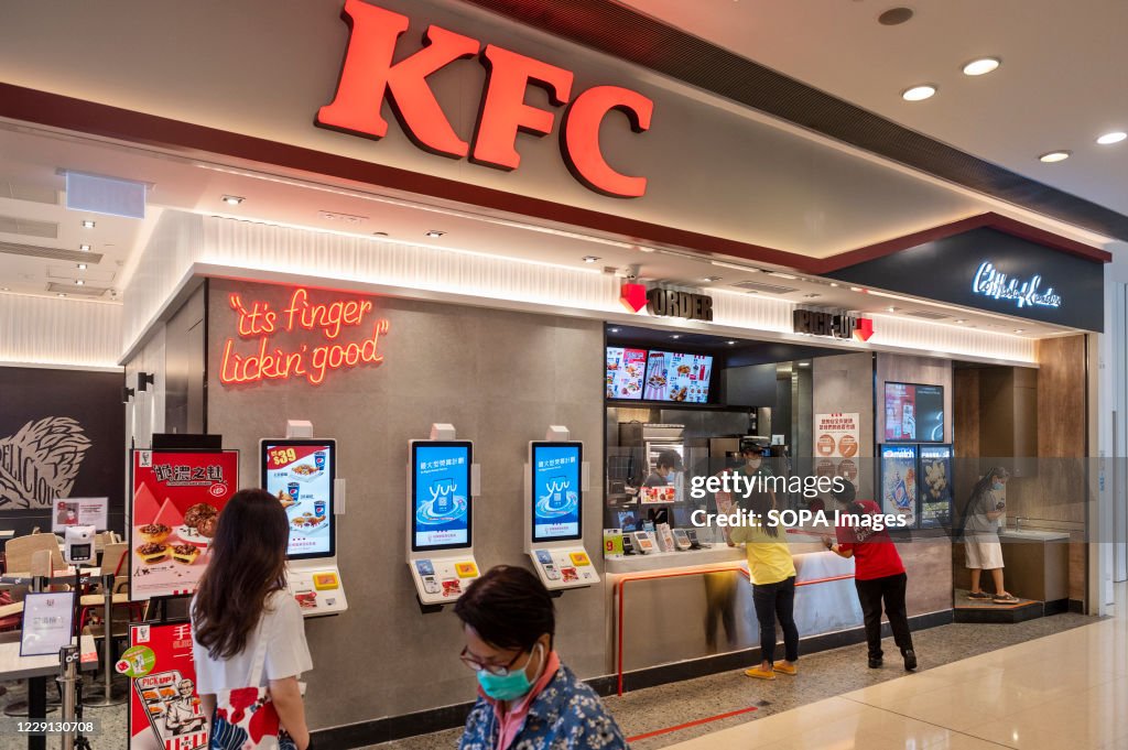 Customers order for food at the American fast food chicken...