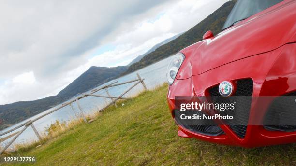View of the Alfa Romeo 4C Spider, at Lago di Campotosto , near L'Aquila, Italy, on October 4, 2020. The Alfa Romeo 4C is a mid-engined, lightweight,...