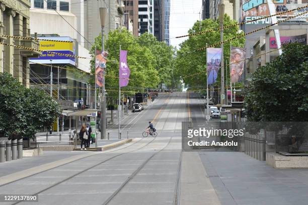 View of nearly empty street during the strict restrictions due to the novel coronavirus pandemic in Melbourne, Australia on October 18, 2020. The...