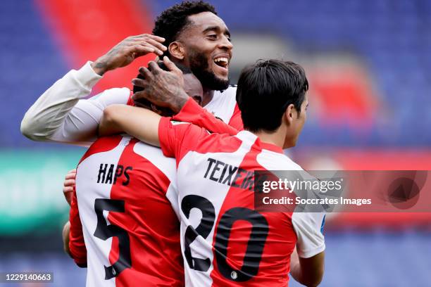 Ridgeciano Haps of Feyenoord celebrates 1-0 with Leroy Fer of Feyenoord, Joao Carlos Teixeira of Feyenoord during the Dutch Eredivisie match between...