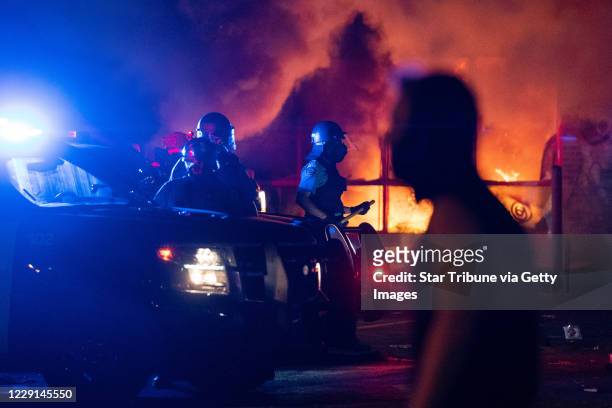 Minneapolis, MN May 27: Rioters set fire to the AutoZone near Lake Street and 27th Ave. Protester and police clashed violently in South Minneapolis...