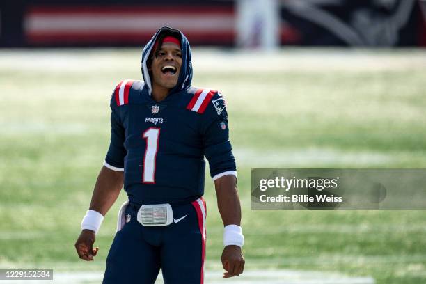 Cam Newton of the New England Patriots reacts before a game against the Denver Broncos at Gillette Stadium on October 18, 2020 in Foxborough,...