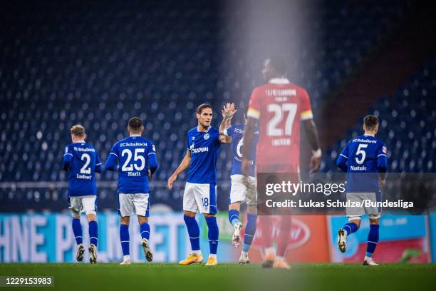 Goncalo Paciencia of Schalke celebrates his teams first goal with team mates of Schalke during the Bundesliga match between FC Schalke 04 and 1. FC...