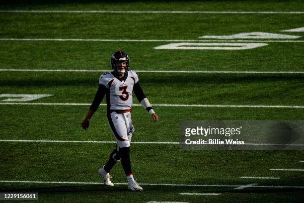 Drew Lock of the Denver Broncos looks on during the second half of a game against the New England Patriots at Gillette Stadium on October 18, 2020 in...