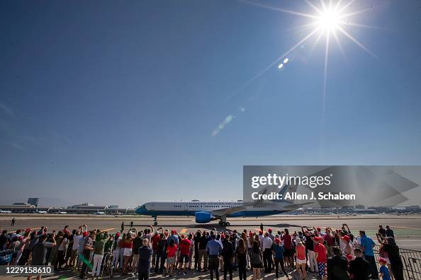 President Donald Trump waves to supporters as he arrives on Air Force One President Donald Trump waves to supporters as he arrives on Air Force One