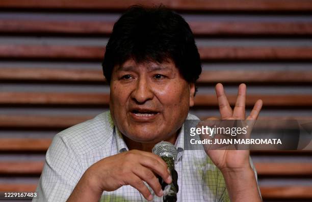 Bolivian ex-president Evo Morales gestures as he offers a press conference in Buenos Aires on October 19, 2020 a day after Bolivia held presidential...