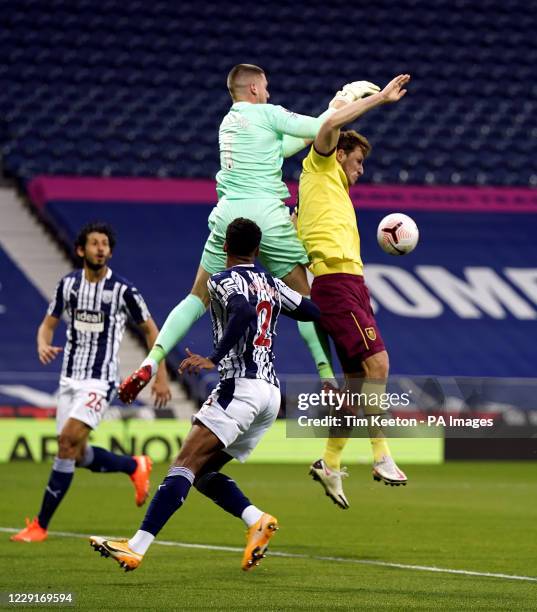 West Bromwich Albion goalkeeper Sam Johnstone drops the ball under pressure from Burnley's Chris Wood during the Premier League match at The...