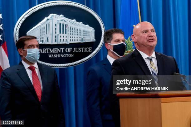 Special Agent in Charge of the Pittsburgh field office Michael Christman, accompanied by Assistant Attorney General for the National Security...